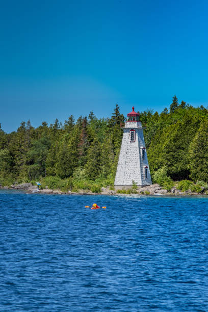 Spectacular scenery in the summer in Georgian Bay in ON, Canada. The lighthouse broken down into little pieces! stock photo