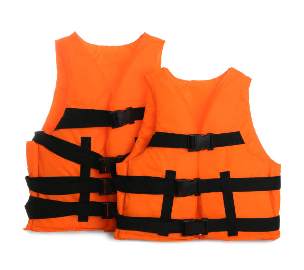 istock Orange life jackets isolated on white. Personal flotation device 1357346219