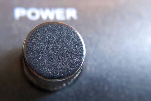 istock Power control adjustment button close-up blurred background macro photo 1357348177