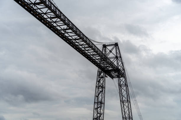 istock Transporter Bridge over the Charente river under a cloudy sky. National monument. Rochefort sur mer. France 1357348223