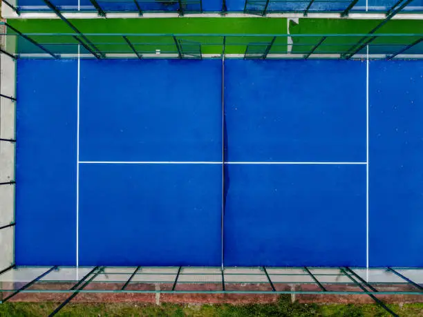 Overhead view of a paddle tennis court from a drone
