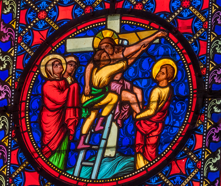 Colorful Jesus Crucifixion Stained Glass Basilica Bayeux Cathedral Our Lady of Bayeux Church Bayeux Normandy France. Church consecrated in 1077