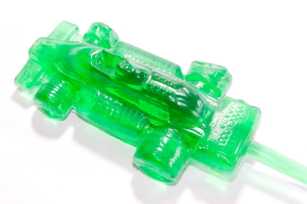 istock Green racing car forming lemon juice package 1357360609