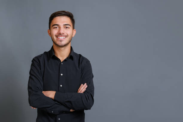 istock Satisfied caucasian guy looking at camera with a big laugh 1357363182