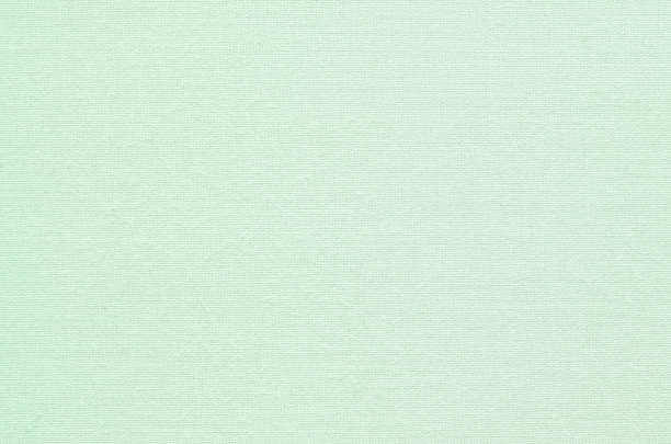 Natural fabric texture background Pastel mint green colored cloth backdrop mint green stock pictures, royalty-free photos & images