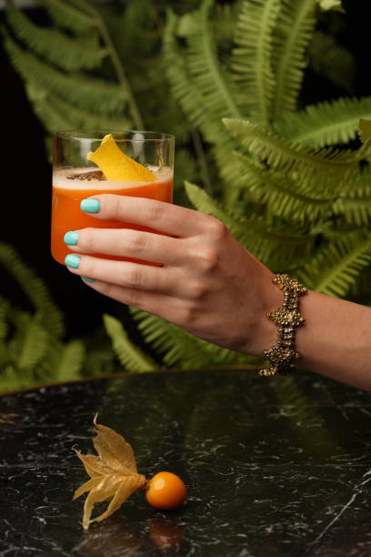 istock Fresh cocktail glass on marble table. Alcohol cocktail 1357370193