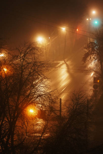istock Foggy Night Street From Above 1357377706