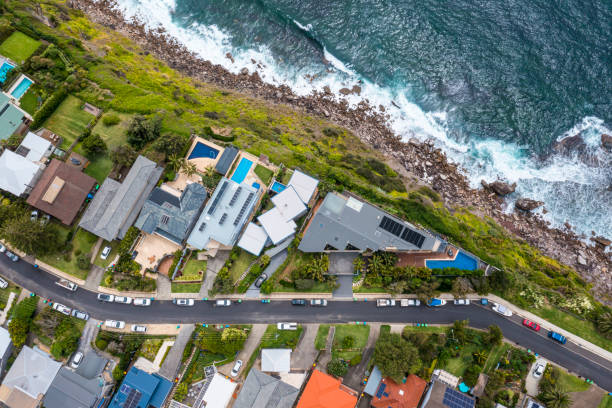 istock Coastal Suburb overhead perspective roof tops 1357384668