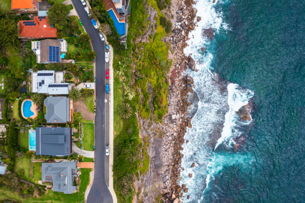 istock Coastal Suburb overhead perspective roof tops 1357385371