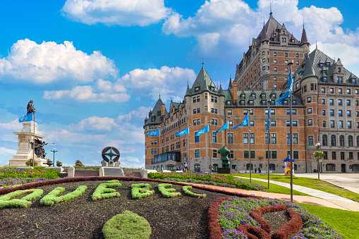Quebec City, Quebec, Canada, 20 September, 2021: Famous Chateau Frontenac in Quebec historic center located on Dufferin Terrace promenade with scenic views and landscapes of Saint Lawrence River