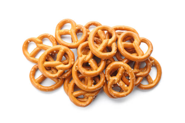 istock Delicious crispy pretzel crackers isolated on white, top view 1357397795