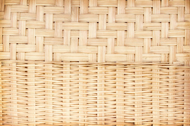 istock Old weaving bamboo wood wall surface for light brown background in seamless patterns 1357400282