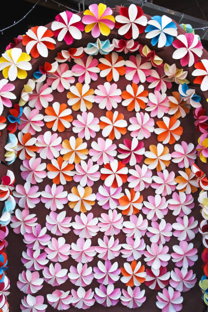 istock Archway  colorful flower paper shaped patterns decoratived on wall background 1357403903