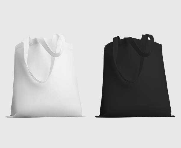istock Mock up of white, black totebag 3d rendering, ecobag with shopping handle, isolated on background. Set 1357406624