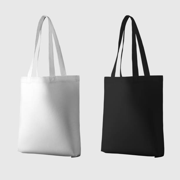 istock Mock up of white, black totebag 3d rendering, ecobag with shopping handle, isolated on background. Set 1357406632