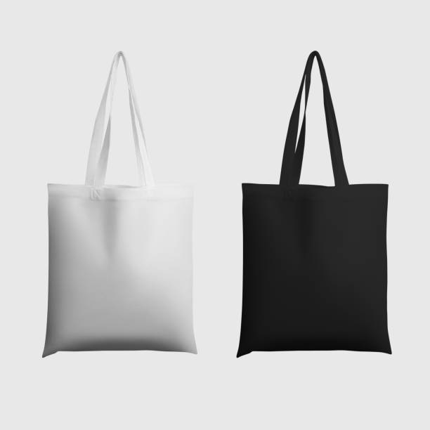 istock Mock up of white, black totebag 3d rendering, ecobag with shopping handle, isolated on background. Set 1357406641