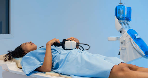istock Woman lying on MRI scanner before scan 1357407570