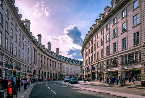 London, UK - September 15 2018: View of the curve of Regent Street, near Piccadilly Circus in the evening. Regent Street is major tourist attraction and shopping destination in London's West End.