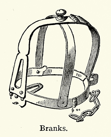 Vintage illustration of a Scold's bridle, witch's bridle, a brank's bridle, or simply branks. An instrument of punishment, as a form of torture and public humiliation. It was an iron muzzle in an iron framework that enclosed the head.