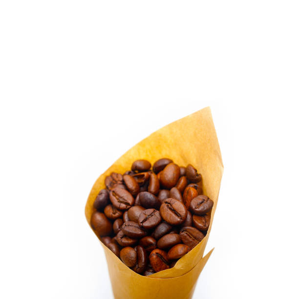istock espresso coffee beans on a paper cone 1357419927