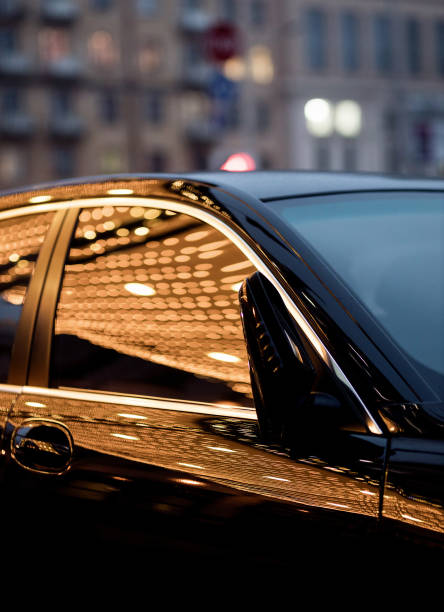 istock car on the night city 1357420076