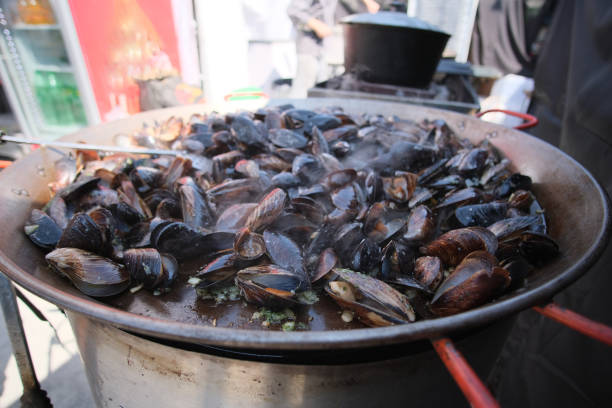 istock baking mussels on frying pan at summer day 1357421835