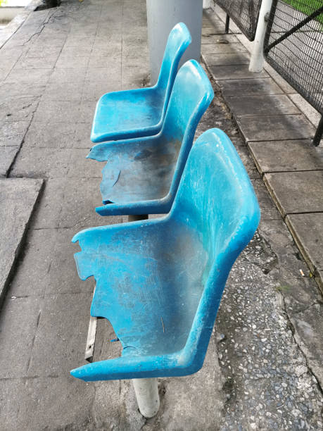 istock broken blue chair at the bus stop 1357421900