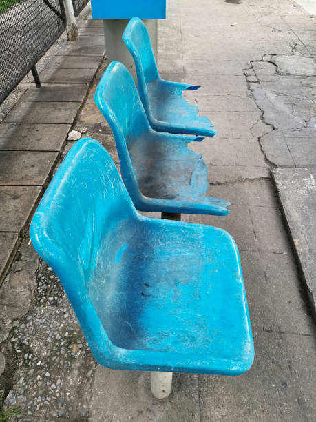 istock broken blue chair at the bus stop 1357422760