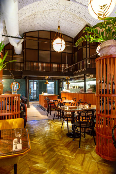 istock Interior of modern loft style restaurant. Bar counter 1357422959