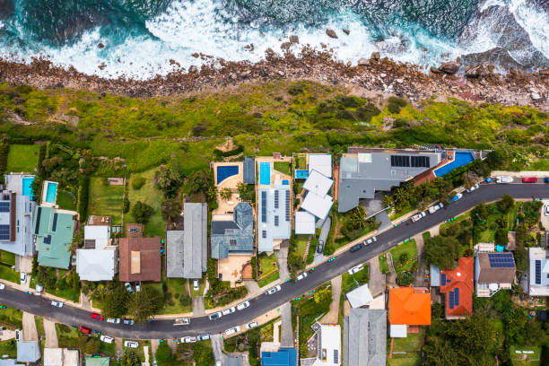 istock Coastal Suburb overhead perspective roof tops 1357423049