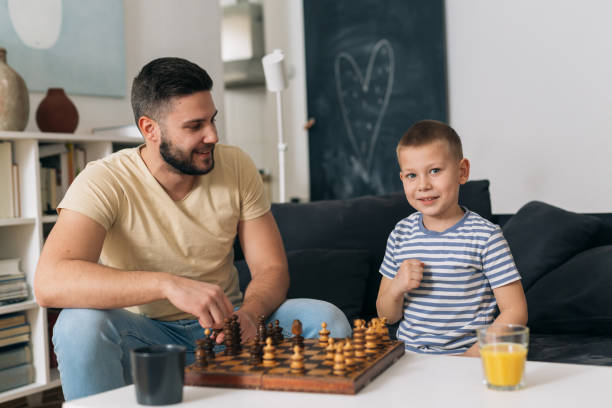 istock father and son at home 1357425201