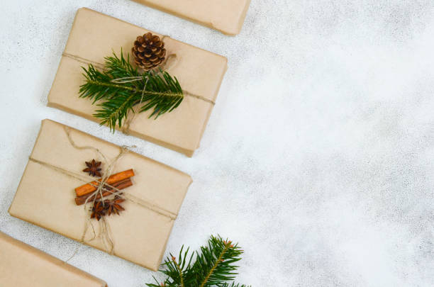 istock eco friendly merry christmas gift in craft paper wrapping, zero waste reusable concept, natural decor and sustainable lifestyle no people 1357425866