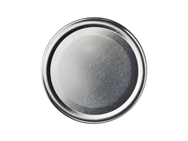 Round metal lid for cans. Isolated on a white background top view Round metal lid for cans. Isolated on a white background top view can top stock pictures, royalty-free photos & images