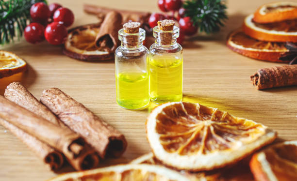 istock Christmas essential oils in a small bottle. Selective focus. 1357429196