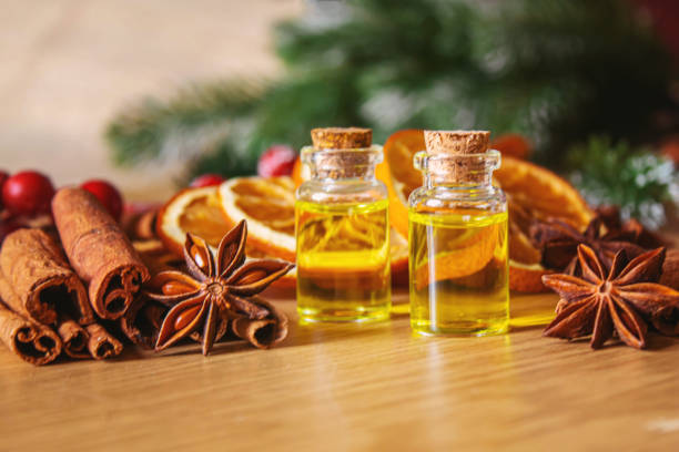 istock Christmas essential oils in a small bottle. Selective focus. 1357429222