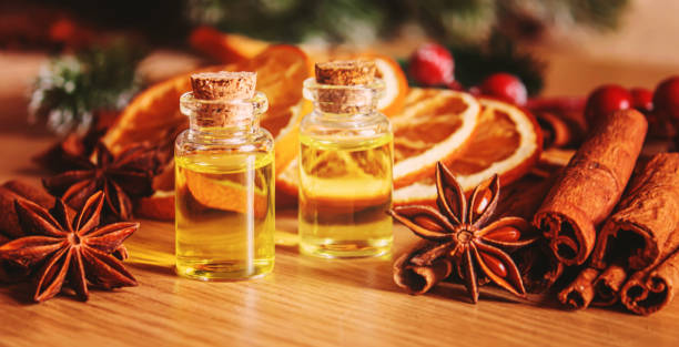 istock Christmas essential oils in a small bottle. Selective focus. 1357429224