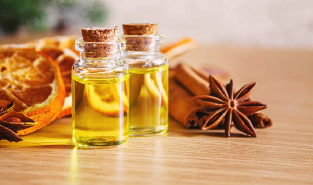 istock Christmas essential oils in a small bottle. Selective focus. 1357429226
