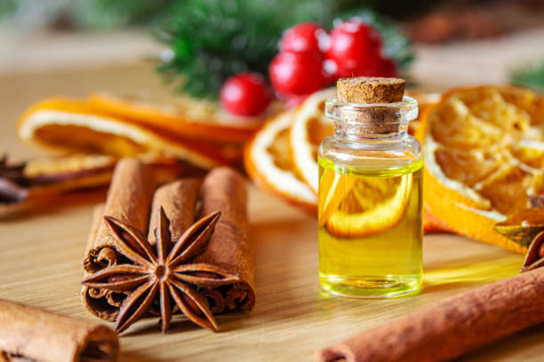 istock Christmas essential oils in a small bottle. Selective focus. 1357429245