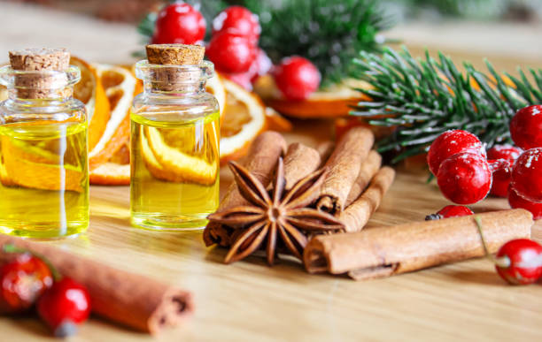 istock Christmas essential oils in a small bottle. Selective focus. 1357429258