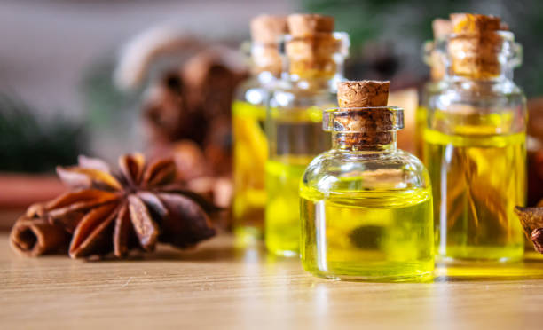 istock Christmas essential oils in a small bottle. Selective focus. 1357429311