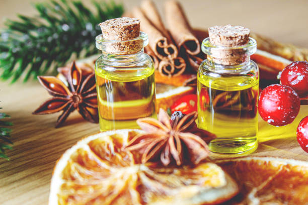 istock Christmas essential oils in a small bottle. Selective focus. 1357429318