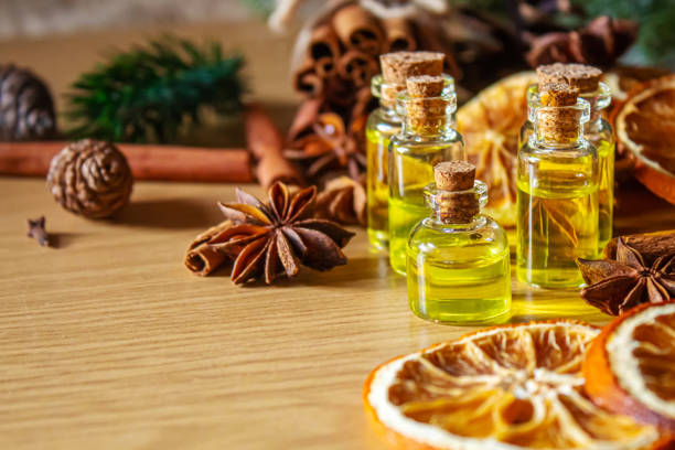 istock Christmas essential oils in a small bottle. Selective focus. 1357429324