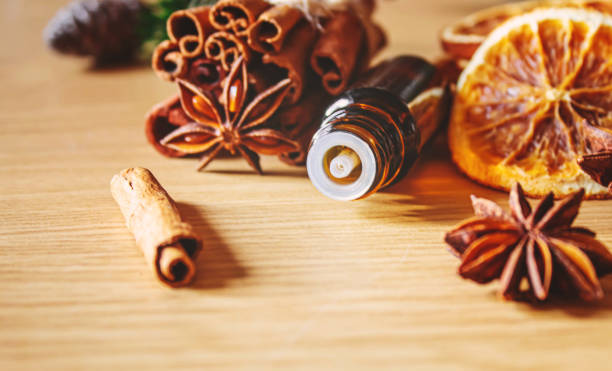 istock Christmas essential oils in a small bottle. Selective focus. 1357429355