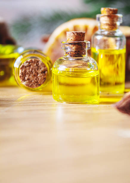 istock Christmas essential oils in a small bottle. Selective focus. 1357429374