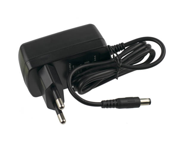 istock AC adapter of External hard drive isolated on white background with clipping path. 1357429449