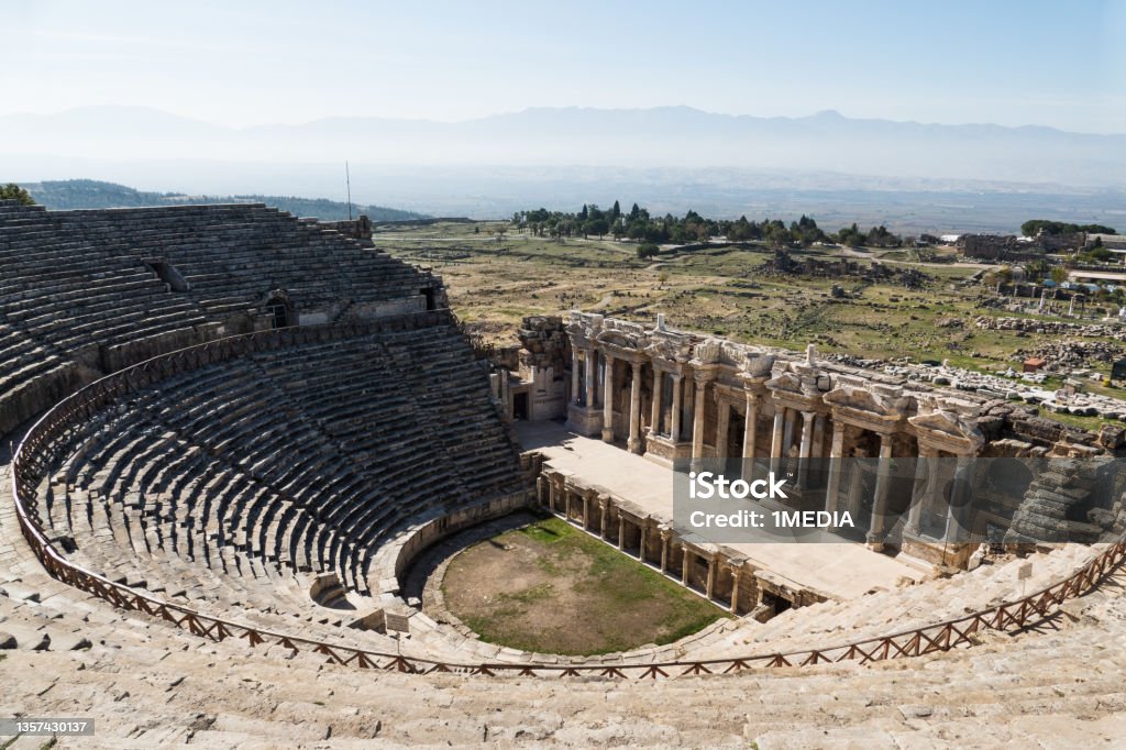 Hierapolis theatre panorama in Pamukkale Hierapolis, ancient greek city in Pamukkale, Turkey Amphitheater Stock Photo