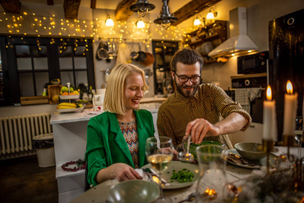 istock Happy coule on a Christmas dinner 1357432895