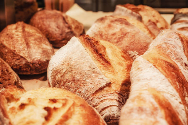 istock bread on a shelf in a bakery close-up on a dark background in a low key 1357433340