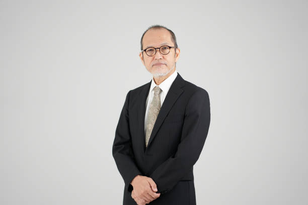 istock Elderly Asian businessman in trouble 1357435829