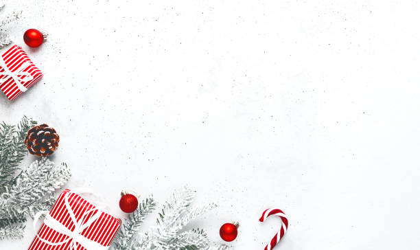 Christmas and New Year flat lay with two red white striped present gift boxes